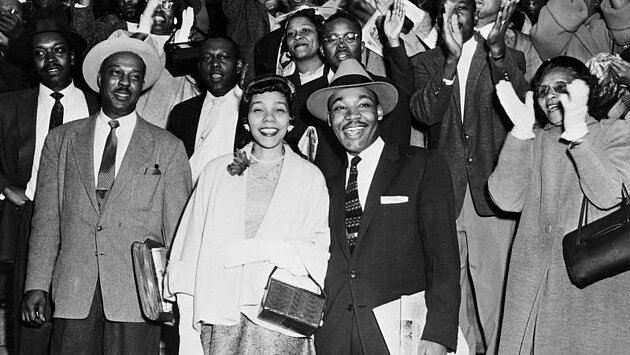 Black and white photograph of young MLK and Hamer